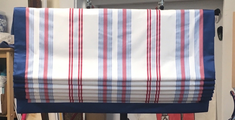 Fabric roman shades with striped pattern